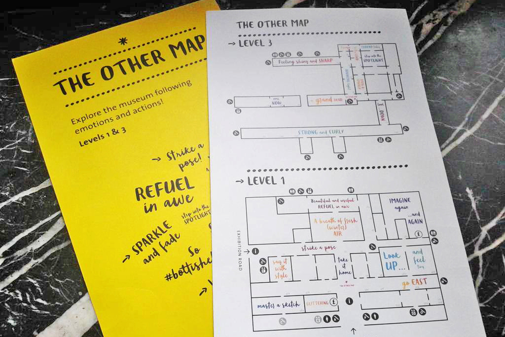 A yellow map at the V&A called 'The Other Map'. It offers different experiences to visitors than usual museum maps, and highlights places in which visitors can use their emotions and actions to 'Look up', 'Strike a pose' and 'Imagine'.